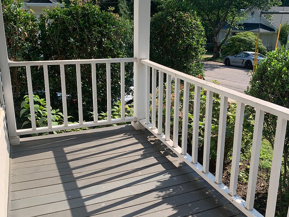 Outside porch, on street parking.
Pretty neighborhood.