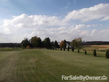 Living Room-facing west
						:
						Large Deck outside is through the patio doors.