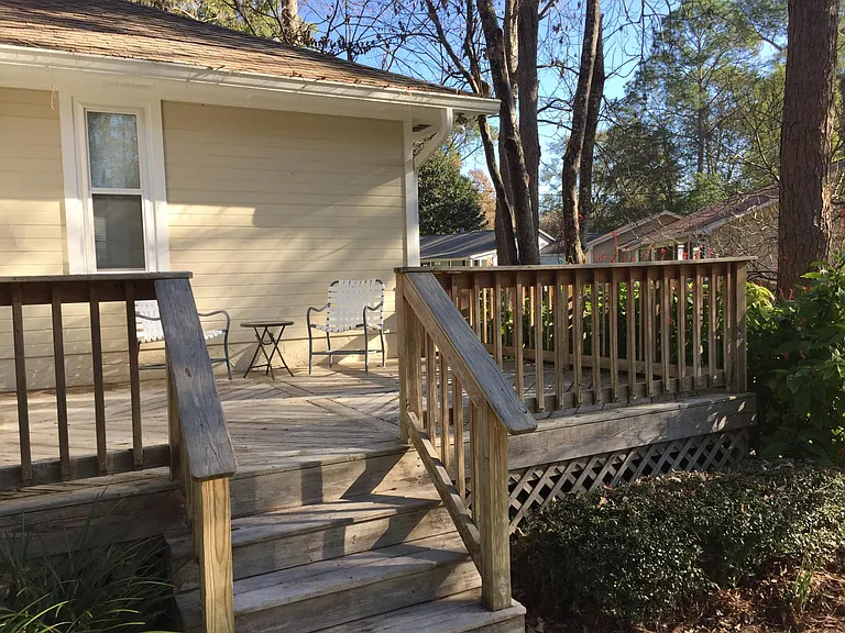 Deck in back. Enjoy shade and sunshine in the private backyard.