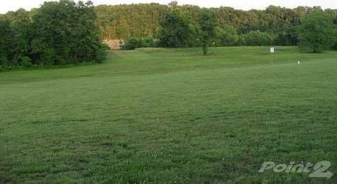 large back yard with mowed to the waters edge access, that borders the corp property