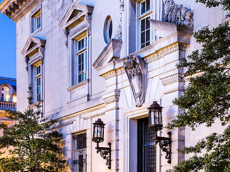 Exterior of Leasing Office with opulent entrance during twilight