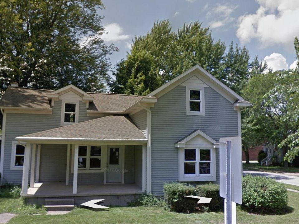 Older image of home- since has new landscape, sidewalks, and new yard. Entrance for 257 centennial is opposite side of home.