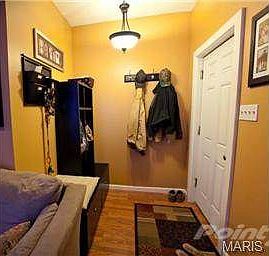 Spacious 6'x 6' foyer.