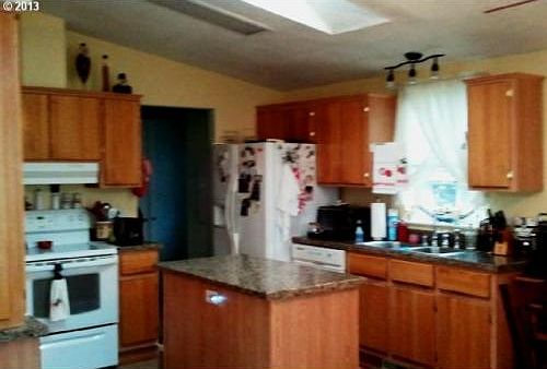 amazing kitchen with stainless drawer pull outs