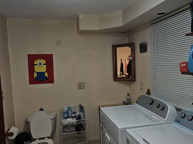 Laundry with Half Bath and lot of storage
