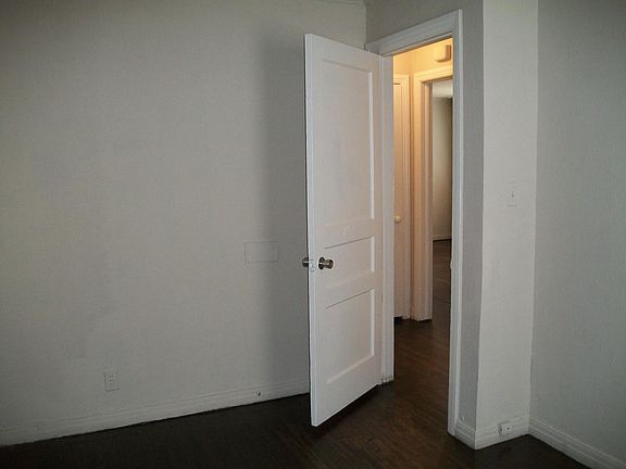 Hallway connecting living area to two of the bedrooms
