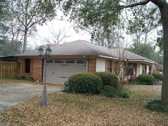Side garage entrance and front of house.
