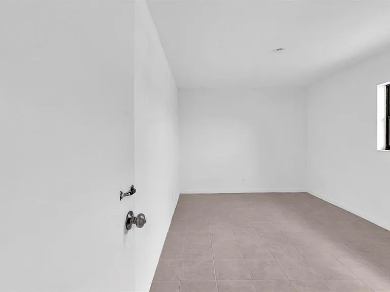 5748 NW 27th Ct — Photo 14