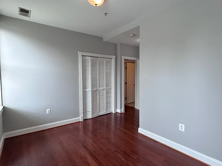 Primary bedroom from corner