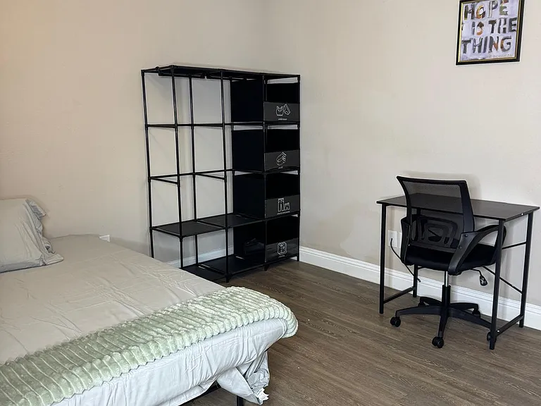 1st Level Fully furnished with a cozy bed, a sleek desk for work or study, and a roomy closet to keep everything organized.