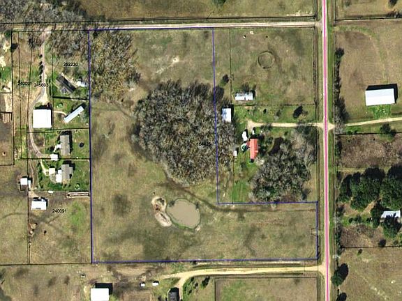 Blue outline is the approximate boundaries of the 10.3 acre property.