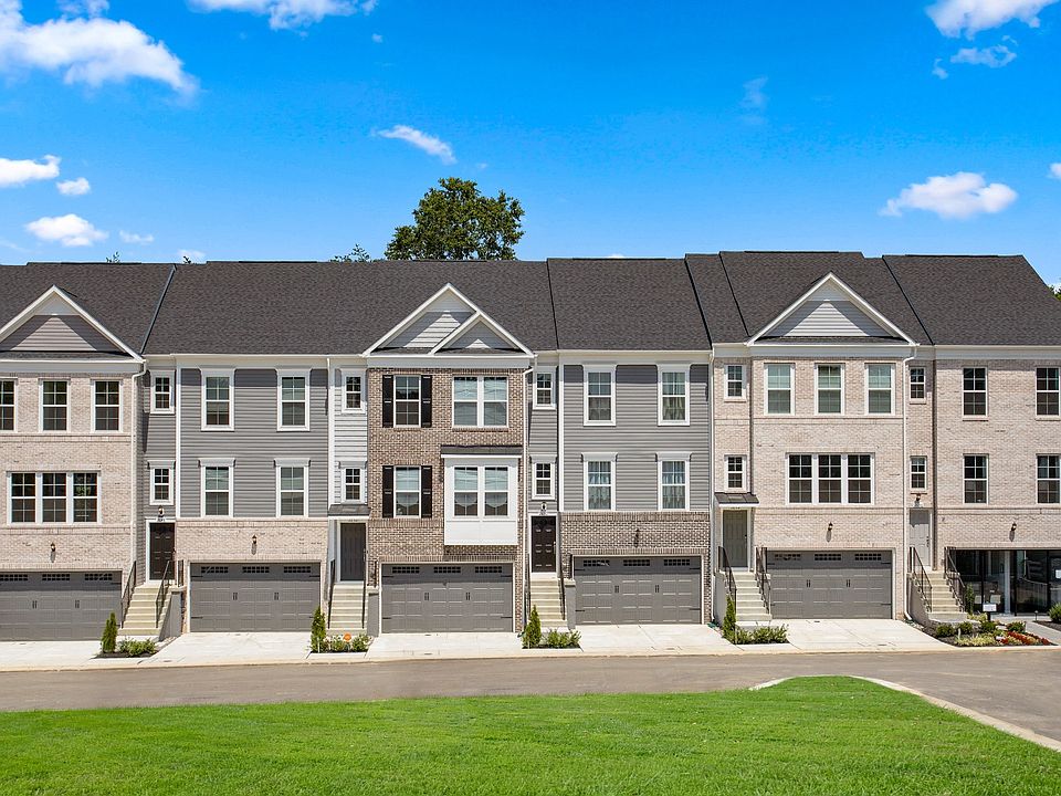 Exterior view of Harlow II townhome front entry 2-car garage