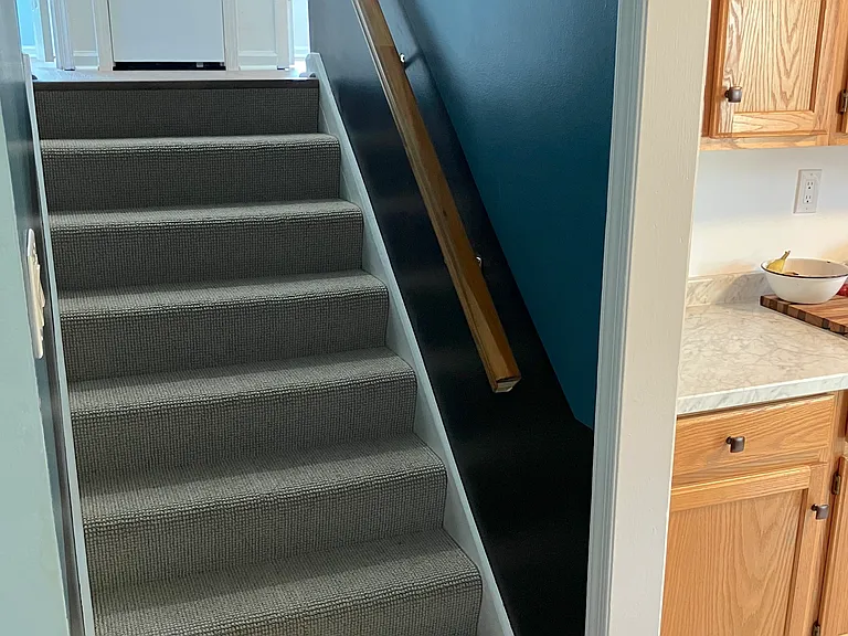 Brand new carpet leads to the second floor with three bedrooms and full bathroom.