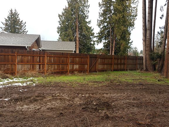 fence runs along west side
