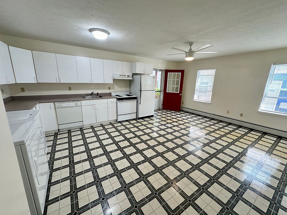 Large eat in kitchen with dishwasher and washer and dryer provided