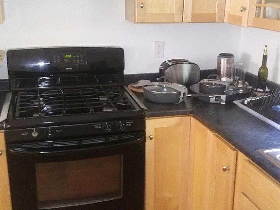 Eat-in Kitchen Table with 4 chairs, Bosh DishWasher, Two Islands, Keurig Coffee Maker, Microwave Oven, Stove, All indoor and outdoor utensils, Glassware/ Dishware, TWO Islands & Refrigerator