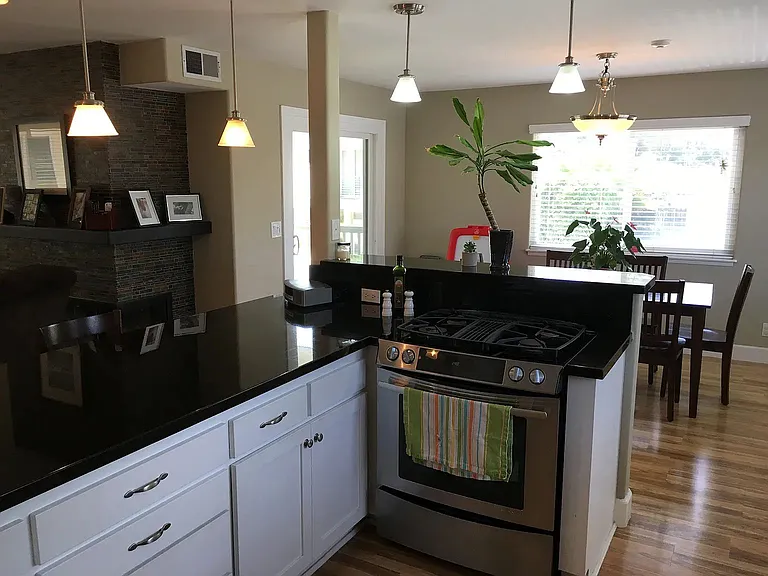 Appliances are included. Also a side door to the balcony for outdoors BBQ.