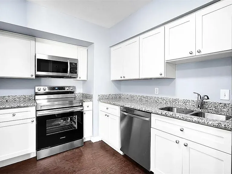 Full size over the range microwave and full size dishwasher in all units.