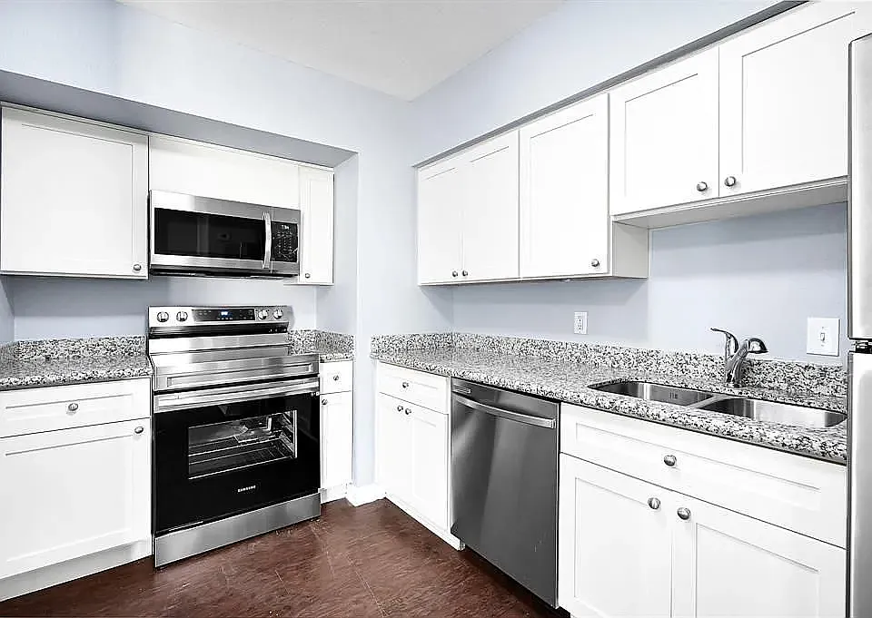 Full size over the range microwave and full size dishwasher in all units.