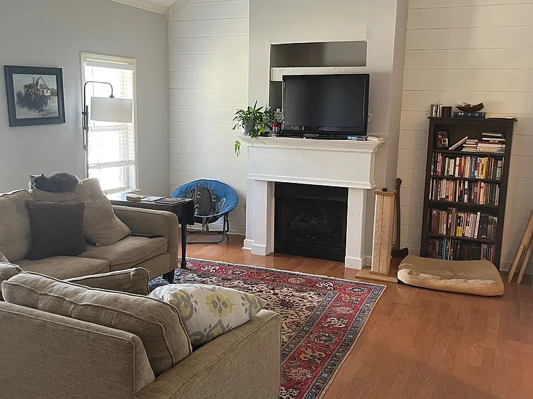 Living room with gas fireplace.