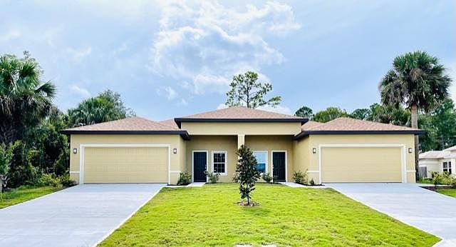 New construction duplex! Two car garage. Separate entry to each side.