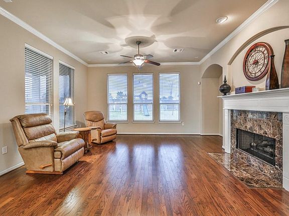 The family room is generous in space and can be used to fit your needs