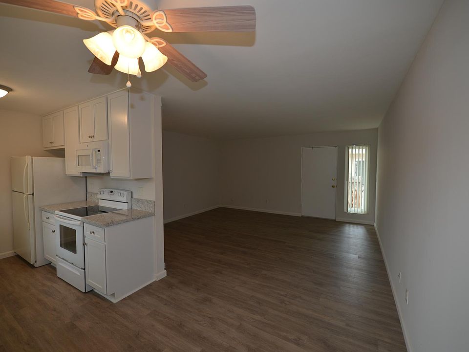 Dining area looking into living room