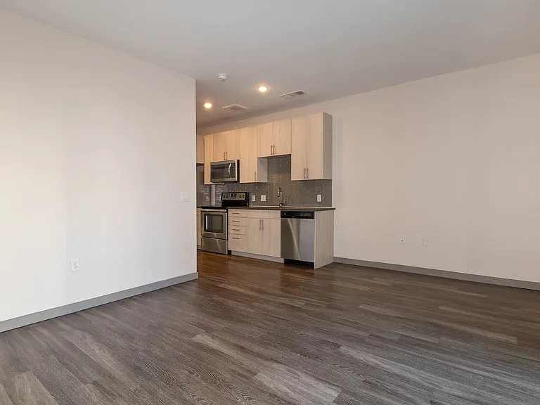 Living Area and Kitchen with Hard Surface Flooring