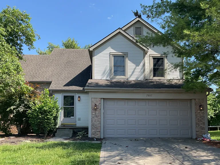 7557 Harbour Town Dr — Photo 1