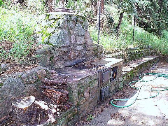 stone grill in backyard