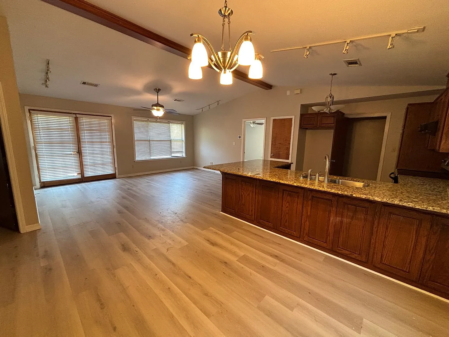 Located on the outskirts of Russellville, this three-bedroom, two-bath home — Photo 3