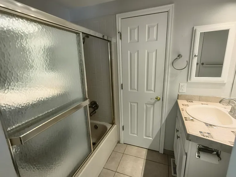 Upstairs Jack and Jill Bathroom Looking Towards Master Bedroom Door