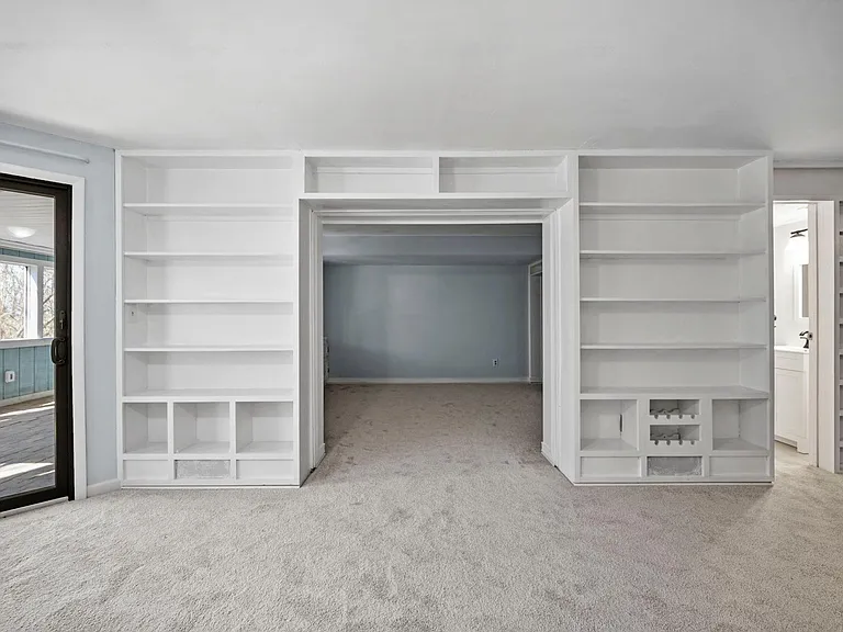 wood work/book shelves in lower level living area