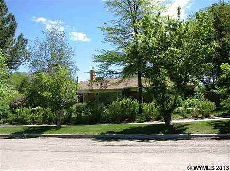Generous corner lot with 16800 sf surrounded by lush greenery.