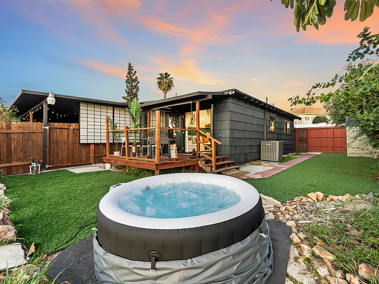A cozy hot tub that transforms your space into a soothing retreat!
