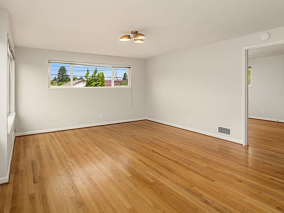 Incredibly large and spacious oversized living room easily fits large sectional and more. New construction does not come close to this.