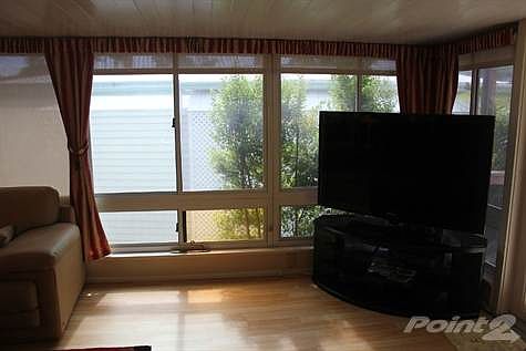 SHADES OPEN IN LIVING ROOM