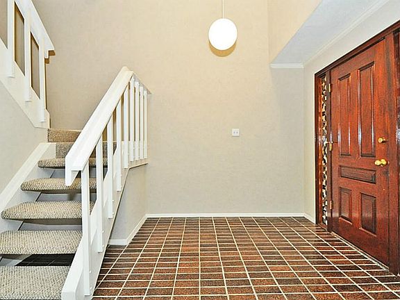Entry is spacious and open and from  it you walk into the large formal living room.