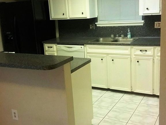 Plenty of counter/cabinet space! Refrigerator Included!