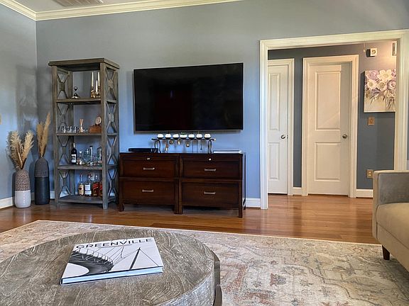 living room w/ large t.v.