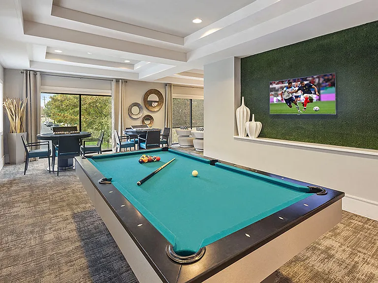 24 hour game room features TVs, billiards table, poker tables and Wall Scrabble