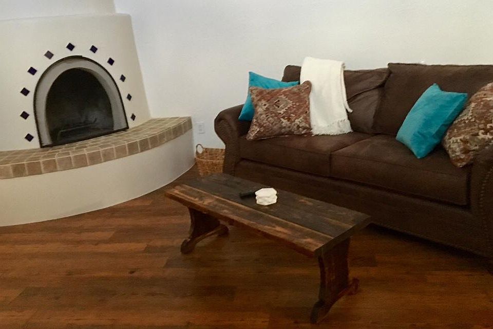 Living room area with Kiva fireplace