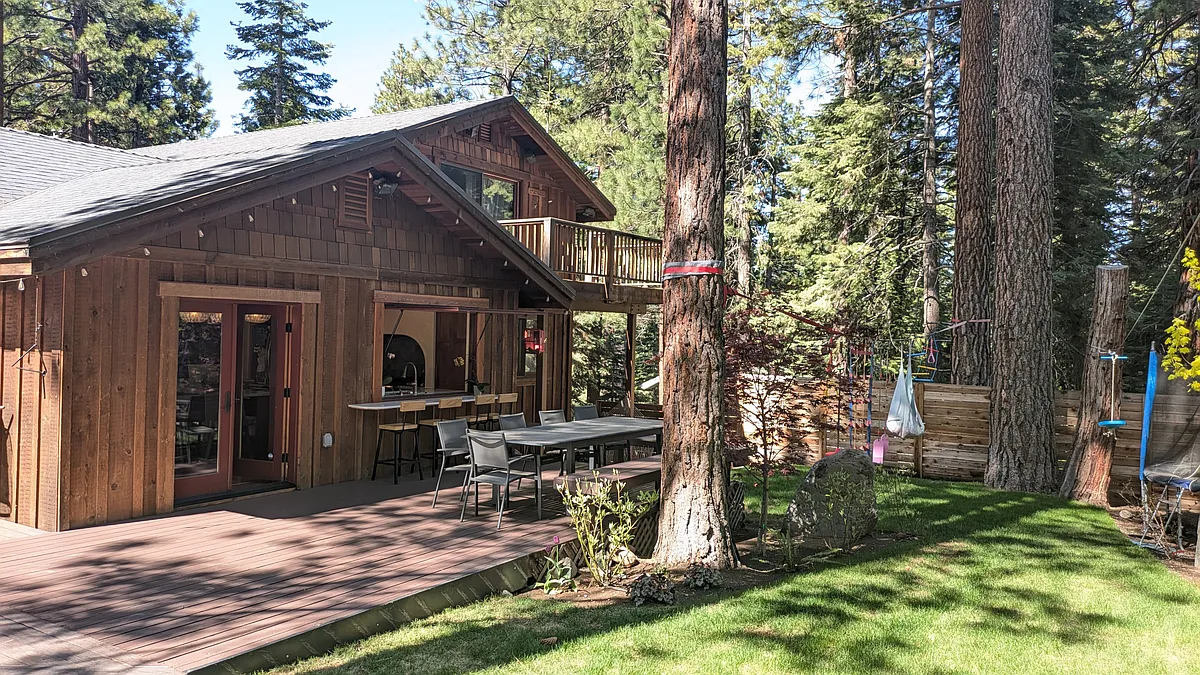 Back deck provides private entertaining space with direct access to kitchen - 8841 Dolly Varden Ave