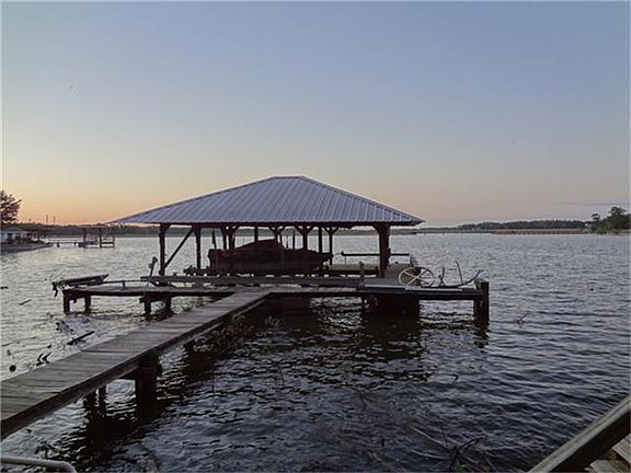 COVERED BOATHOUSE FOR 2 BOATS AND  JET SKIS