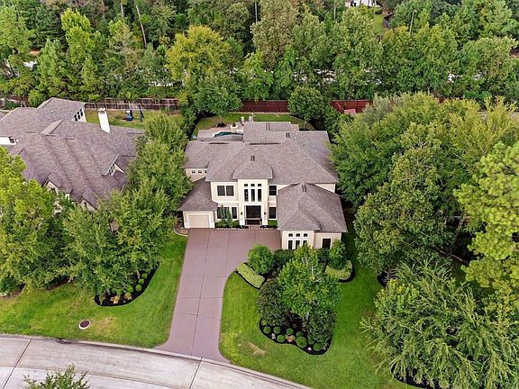 Mature trees, lush landscaping and no back neighbors create a beautiful view from the home.