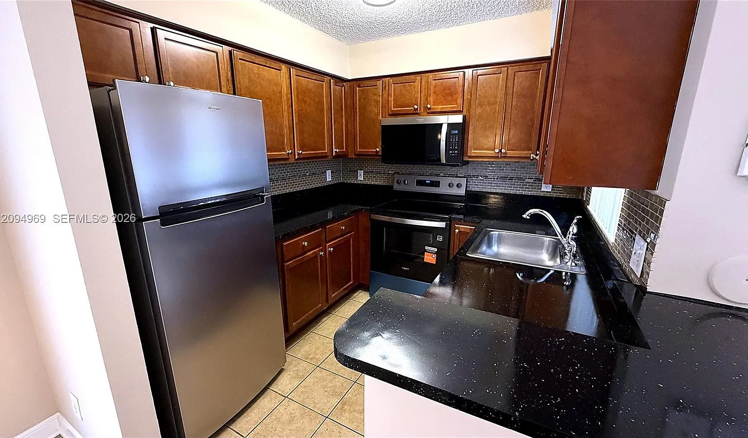 South Palm Place Condo — Photo 2