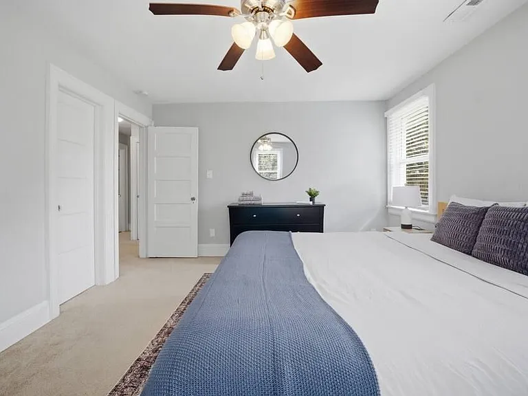 Bedroom 3: Plenty of storage and light in this room with a queen size bed.