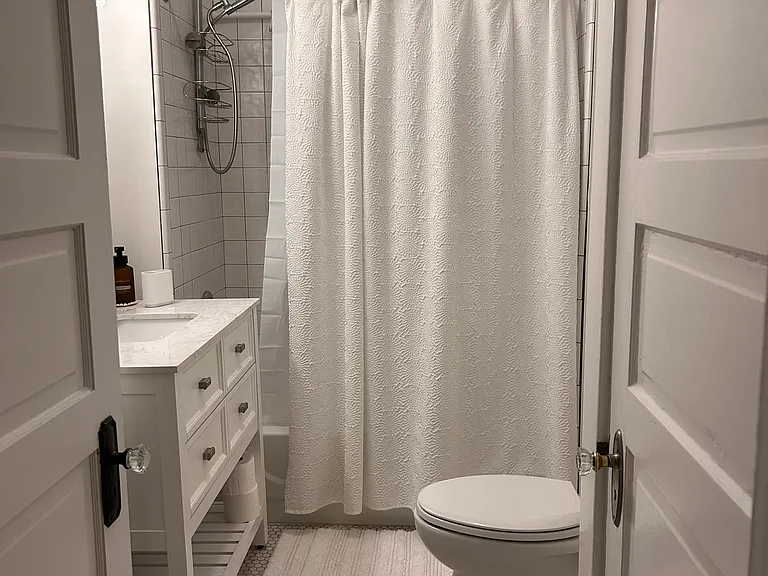Bath with large tub shower
