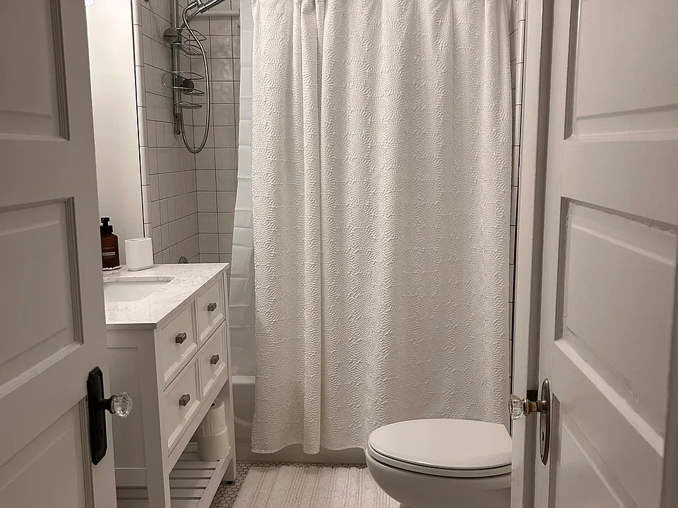Bath with large tub shower