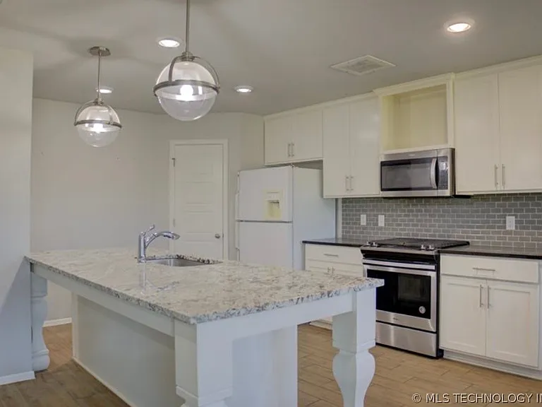 7012 S Elder Ave — Photo 7